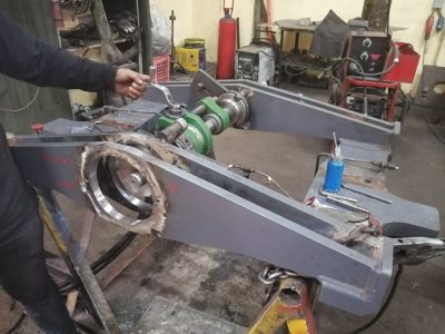 BARRENADO DE ALOJAMINTO DE BOCINA Y PIN DE EJE OSCILANTE